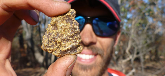 Angus James with gold nugget