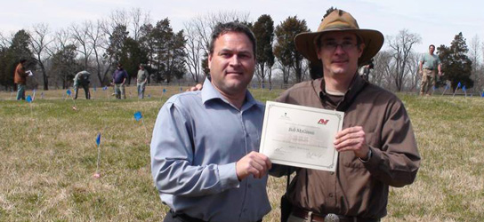 Gary Schafer (Vice President of Minelab Americas) and Dr. Matthew Reeves (Director of Archaeology at Montpelier) proudly display the Course Certificates that each participant will earn at the end of the week-long course