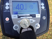 metal-detector-finds-coin.jpg metal-detector-finds-coin.jpg