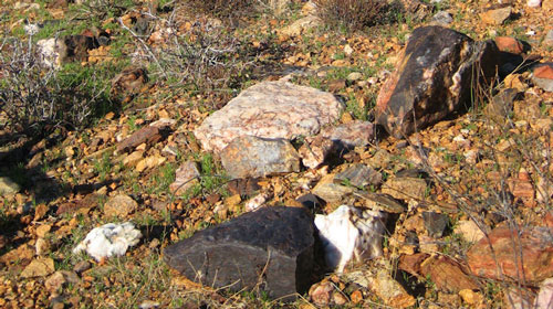 Ground covered with hot rocks making gold prospecting difficult with a metal detector