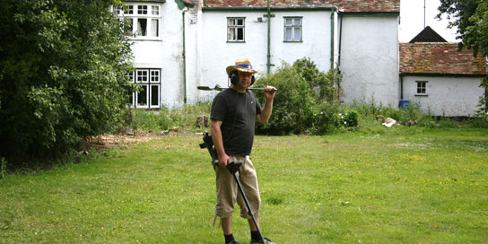 Me searching the garden of an old farmhouse