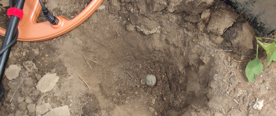Small crotal bell in the hole X-TERRA metal detector