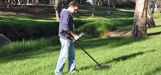 Brenton O'Brien using the CTX 3030 metal detector