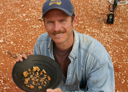 Chris Gholsion expert metal detector operator showing gold that he has found with a metal detector