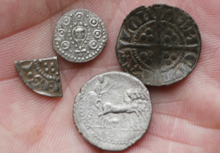 Coins found by an E-TRAC metal detector