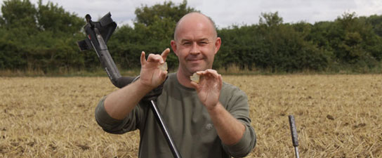 Julian Evan-Hart showing his metal detecting finds