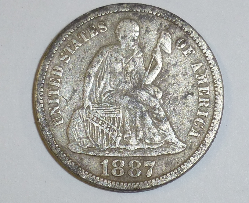 1877 sentado dime